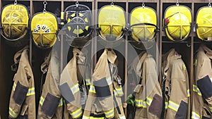 Lineup of Firefighter gear in a firehouse